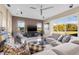 Comfortable living room with a fireplace, ample seating, and a relaxing atmosphere at 4315 70Th E Ave, Ellenton, FL 34222