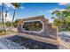 Stone community sign for Oakleaf Hammock, featuring a black and gold nameplate and landscaped surroundings at 4315 70Th E Ave, Ellenton, FL 34222
