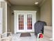 Covered patio with seating and a grill at 5831 Leopardstown Dr, Tampa, FL 33610