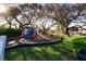 Community playground with slide and other play structures, all set among mature trees at 5831 Leopardstown Dr, Tampa, FL 33610