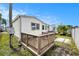 This single Gathering home features a wood deck on a well maintained lawn at 647 Yawl Ln, Palm Harbor, FL 34683