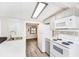 Well-lit kitchen featuring ample counter space, modern appliances, and an open layout at 647 Yawl Ln, Palm Harbor, FL 34683