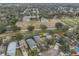 This property features a spacious yard, a fenced perimeter, and is near a serene pond at 6930 Summer Harbor Ln, Riverview, FL 33578