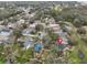 The property boasts solar panels, lush landscaping, and proximity to a tranquil pond at 6930 Summer Harbor Ln, Riverview, FL 33578