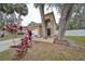 Charming home featuring an attached two-car garage, mature trees and well maintained landscaping at 6930 Summer Harbor Ln, Riverview, FL 33578