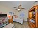 Bedroom featuring natural light with hard surface floors and ceiling fan at 727 Flamingo Dr, Apollo Beach, FL 33572