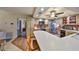 Efficient kitchen with stainless steel appliances, breakfast bar, and wood-look cabinetry at 727 Flamingo Dr, Apollo Beach, FL 33572