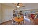Open concept living room and kitchen showcasing hardwood floors and a connecting layout at 727 Flamingo Dr, Apollo Beach, FL 33572