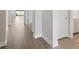 Hallway with elegant baseboards and luxury vinyl flooring at 8521 Dove Bog Ter, Parrish, FL 34219
