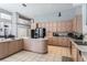 Spacious kitchen with ample cabinet space, center island, and modern appliances at 10084 Twelve Oaks Ct, Weeki Wachee, FL 34613