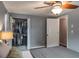 Bedroom with a ceiling fan and closet at 1016 Greenleaf Way, Tarpon Springs, FL 34689