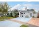 Well-maintained single-story home with a spacious driveway and a neatly landscaped yard at 1016 Greenleaf Way, Tarpon Springs, FL 34689