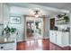 Bright kitchen area with door leading to outdoor patio at 1016 Greenleaf Way, Tarpon Springs, FL 34689