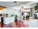 Bright kitchen with stainless appliances and sliding doors to the patio at 1016 Greenleaf Way, Tarpon Springs, FL 34689