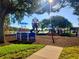 Community playground with colorful play structures and equipment for recreation and fun at 10400 42Nd N St, Clearwater, FL 33762