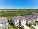 Desirable two-story home with pristine landscaping, enhancing curb appeal in a quiet neighborhood setting at 10741 Charlotte Dr, Parrish, FL 34219