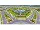 Aerial view showcasing the clubhouse, community pool, and manicured roadways in a residential community at 10741 Charlotte Dr, Parrish, FL 34219
