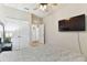 Relaxing bedroom featuring a TV, large closet and comfy bed, perfect for restful nights at 10741 Charlotte Dr, Parrish, FL 34219