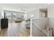 Open living room with ample natural light, wood floors, and modern furnishings, perfect for entertaining at 10741 Charlotte Dr, Parrish, FL 34219