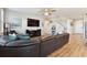 Spacious living room features a ceiling fan, recessed lighting, and stairs to the second floor at 10741 Charlotte Dr, Parrish, FL 34219