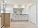 Spacious main bathroom with double vanity sinks, stand up shower, tub and tile floors at 10741 Charlotte Dr, Parrish, FL 34219