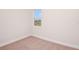 Bedroom with neutral carpet and view from the window at 12160 Cattleside Dr, Riverview, FL 33579