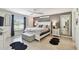 The bedroom features a calming color scheme, ceiling fan, and natural light at 1221 Dustin Rd, North Port, FL 34288