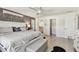 Spacious main bedroom with white trim and ensuite bath access, as well as a walk-in closet at 1221 Dustin Rd, North Port, FL 34288