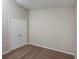Neutral bedroom featuring plush carpeting and a convenient double-door closet for ample storage at 14777 Summer Branch Dr, Lithia, FL 33547