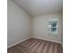 Cozy bedroom with neutral carpet and a bright window providing natural light at 14777 Summer Branch Dr, Lithia, FL 33547