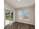 Bright sunroom with sliding glass doors to the patio and large windows that provide ample natural light at 14777 Summer Branch Dr, Lithia, FL 33547
