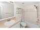 Neutral bathroom with tub, toilet, sink, and chrome hardware at 1810 E Palm Ave # 5222, Tampa, FL 33605