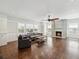 Bright living room with fireplace, hardwood floors, and ample windows at 1825 S 2Nd Street, St Petersburg, FL 33705