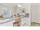Bathroom featuring double sinks, white cabinetry, and lots of mirror space at 19826 Wyndham Lakes Dr, Odessa, FL 33556