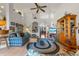Open living room with high ceilings, tile flooring, and views into the dining and foyer at 19826 Wyndham Lakes Dr, Odessa, FL 33556