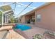 A refreshing pool and spa are enclosed within a screened lanai, offering privacy and comfort at 19826 Wyndham Lakes Dr, Odessa, FL 33556