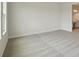 Bedroom featuring soft carpeting, neutral walls, and an adjacent bathroom at 1988 Webbstone Way, Zephyrhills, FL 33541