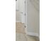 Bright walk-in closet featuring rod and shelf storage system with carpet flooring at 1988 Webbstone Way, Zephyrhills, FL 33541