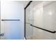 Step-in shower with black hardware and tiled walls at 201 W Laurel St # 811, Tampa, FL 33602