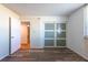 Bedroom featuring wood-look floors, and a sliding door closet system at 201 W Laurel St # 811, Tampa, FL 33602