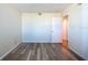 This bedroom features wood floors and neutral walls at 201 W Laurel St # 811, Tampa, FL 33602