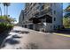 A side-view of the exterior of One Laurel Place with garage access at 201 W Laurel St # 811, Tampa, FL 33602