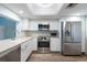 Bright kitchen with stainless steel appliances and stone countertops at 201 W Laurel St # 811, Tampa, FL 33602