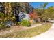 Stone entrance sign for One Laurel Place condo building, framed by foliage and landscaping at 201 W Laurel St # 811, Tampa, FL 33602