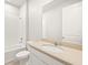 Bright bathroom featuring a shower and tub at 20387 Symphony Pl, Venice, FL 34293