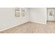 Open living room with neutral walls and tile flooring at 20387 Symphony Pl, Venice, FL 34293