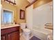 Well-maintained bathroom with vanity, toilet, and bathtub-shower combination at 23717 Coral Ridge Ln, Land O Lakes, FL 34639