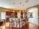 Spacious kitchen with a breakfast bar, dark cabinets, and modern appliances at 23717 Coral Ridge Ln, Land O Lakes, FL 34639