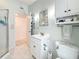 Bathroom with sink and toilet featuring white fixtures at 2593 W Vina Del Mar Blvd, St Pete Beach, FL 33706