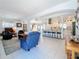 Open-concept living room showcasing seamless flow to the modern kitchen and dining area at 2593 W Vina Del Mar Blvd, St Pete Beach, FL 33706